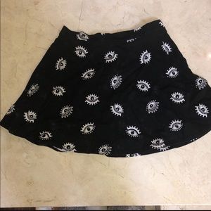Black skirt with eye detail